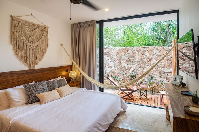 Imagen de la habitación del Hotel Amaka Calma Tulum. Foto 9