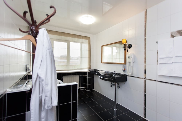 Imagen de la habitación del Hotel Amaks Premier. Foto 12