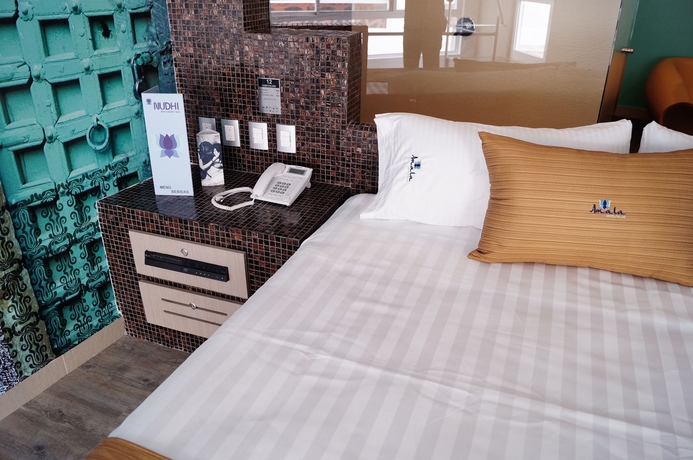 Imagen de la habitación del Hotel Amala. Foto 5