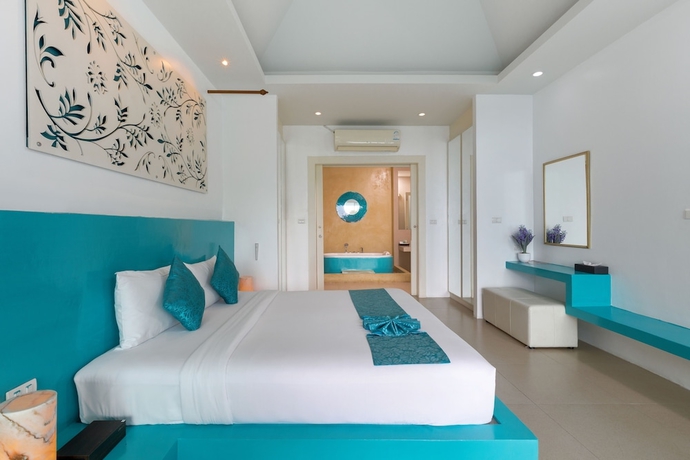 Imagen de la habitación del Hotel Amala Grand Bleu Resort Hilltops. Foto 9