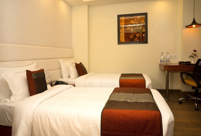 Imagen de la habitación del Hotel Amalfi Grand, Patna. Foto 7