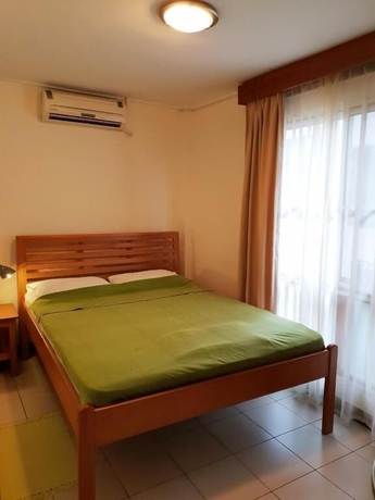 Imagen de la habitación del Hotel Amalia Apartments. Foto 12