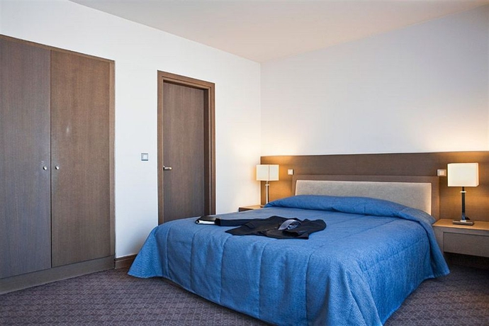 Imagen de la habitación del Hotel Amalia Athens. Foto 10