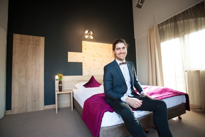 Imagen de la habitación del Hotel Amalienburg Boutique and Boarding. Foto 3