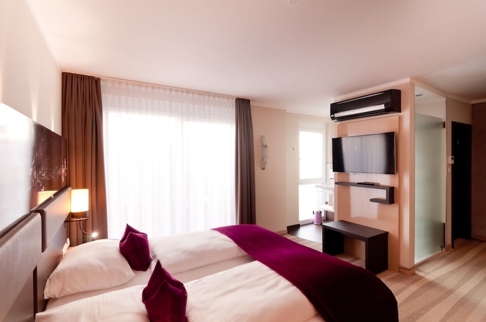 Imagen de la habitación del Hotel Amalienburg Boutique and Boarding. Foto 11