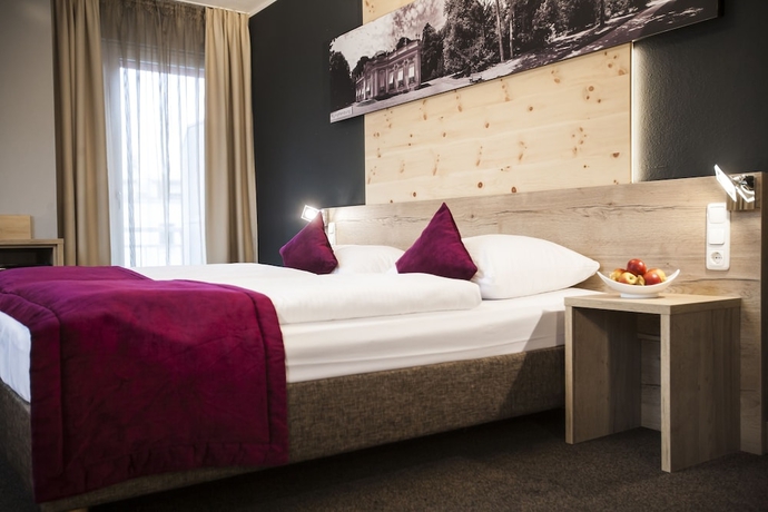 Imagen de la habitación del Hotel Amalienburg Boutique and Boarding. Foto 16