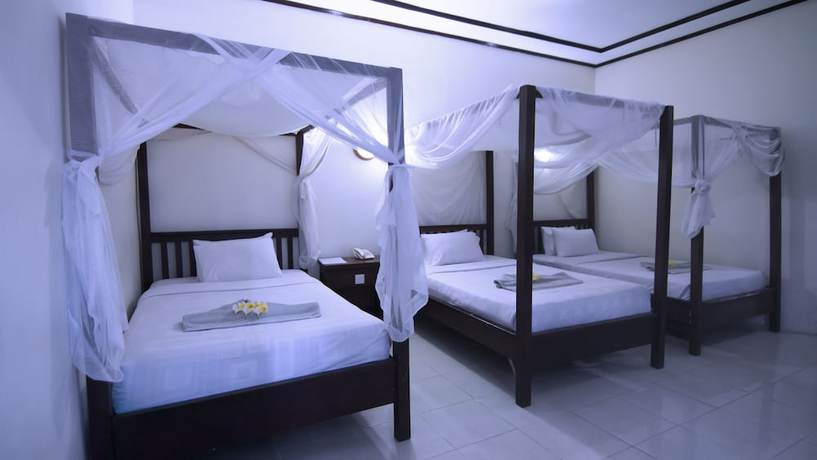 Imagen de la habitación del Hotel Aman Gati. Foto 8