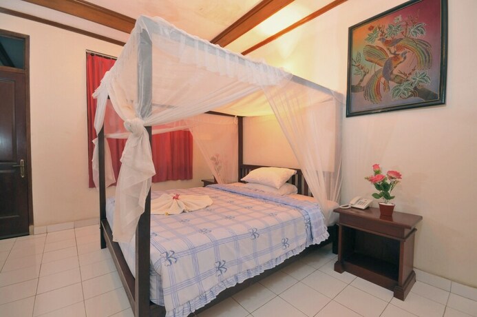 Imagen de la habitación del Hotel Aman Gati Hotel Lakey. Foto 15