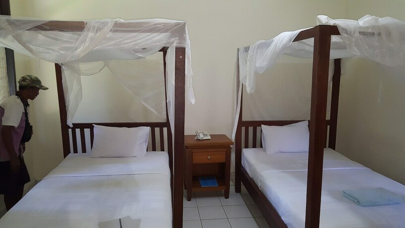 Imagen de la habitación del Hotel Aman Gati Hotel Lakey. Foto 24