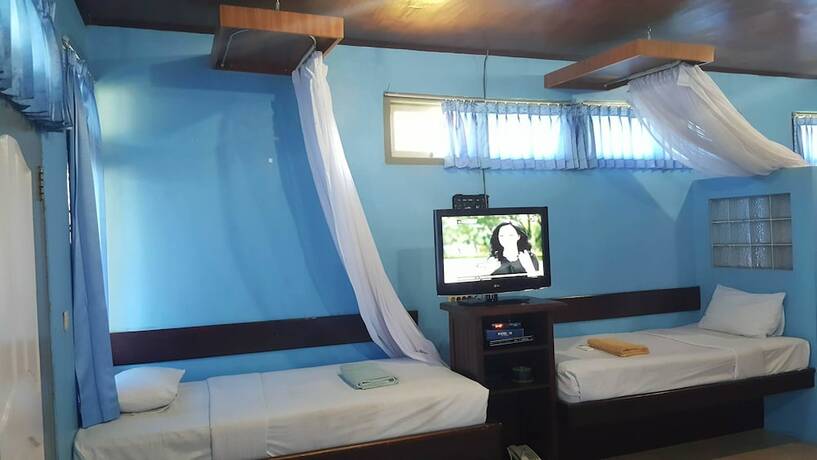 Imagen de la habitación del Hotel Aman Gati Hotel Lakey. Foto 26