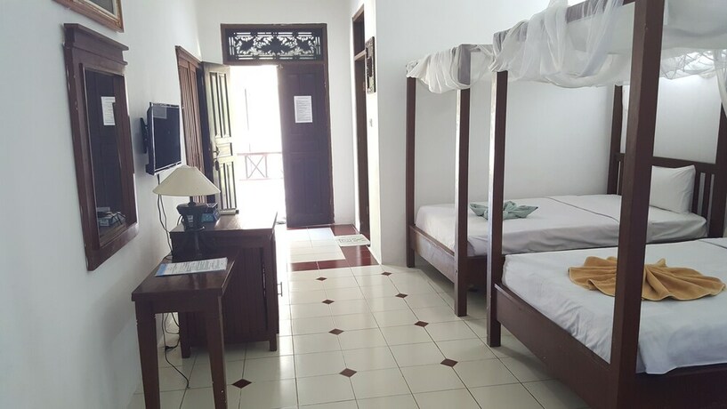 Imagen de la habitación del Hotel Aman Gati Hotel Lakey. Foto 33