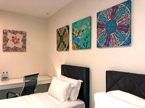 Imagen de la habitación del Hotel Aman Hills. Foto 7