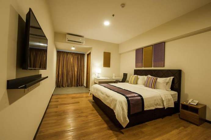 Imagen de la habitación del Hotel Aman Hills. Foto 16