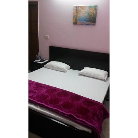 Imagen de la habitación del Hotel Aman Inn. Foto 5