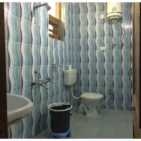 Imagen de la habitación del Hotel Aman Inn. Foto 7