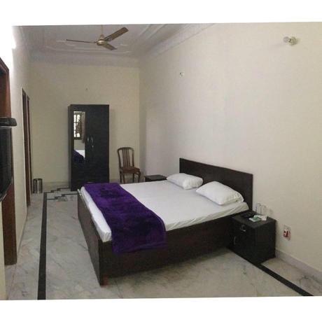 Imagen de la habitación del Hotel Aman Inn. Foto 8