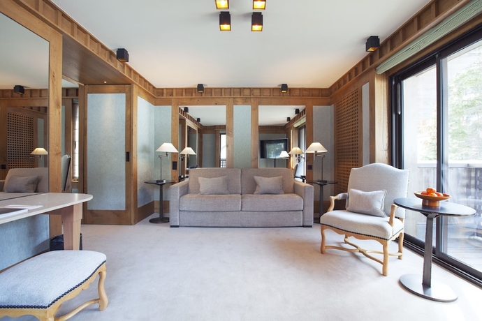 Imagen de la habitación del Hotel Aman Le Mélézin. Foto 4