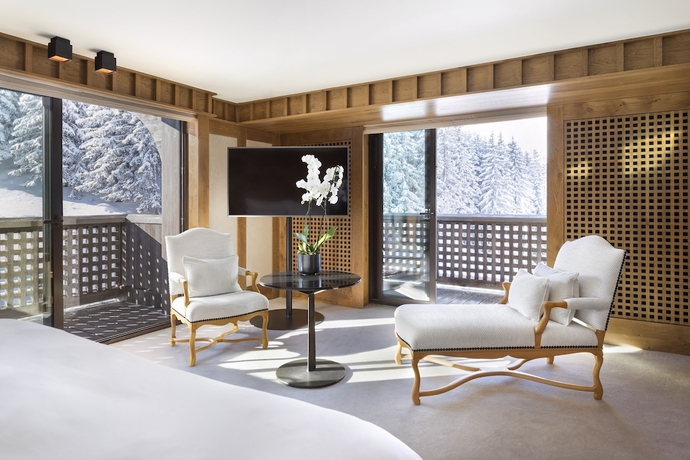 Imagen de la habitación del Hotel Aman Le Mélézin. Foto 15