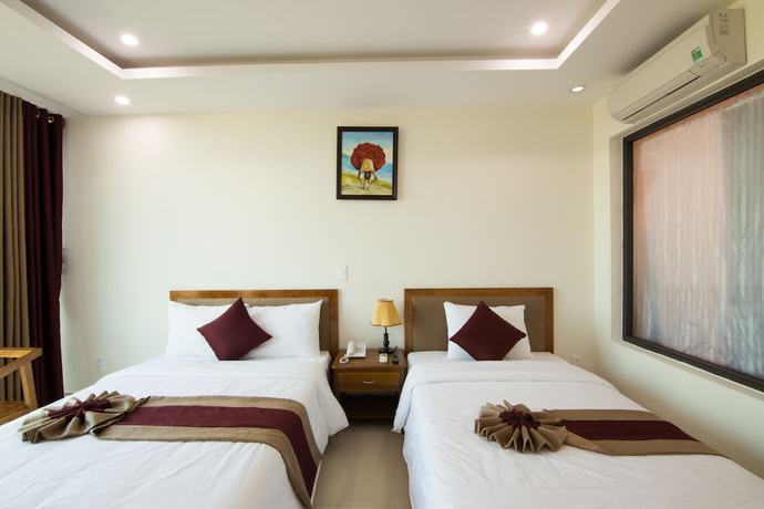 Imagen de la habitación del Hotel Amanda Quang Binh. Foto 10