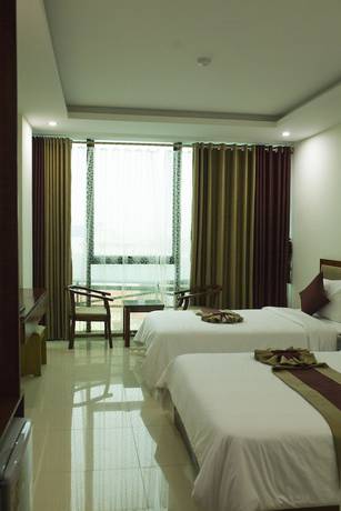 Imagen de la habitación del Hotel Amanda Quang Binh. Foto 12