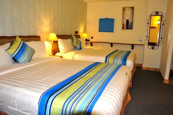 Imagen de la habitación del Hotel Amando Inn. Foto 4