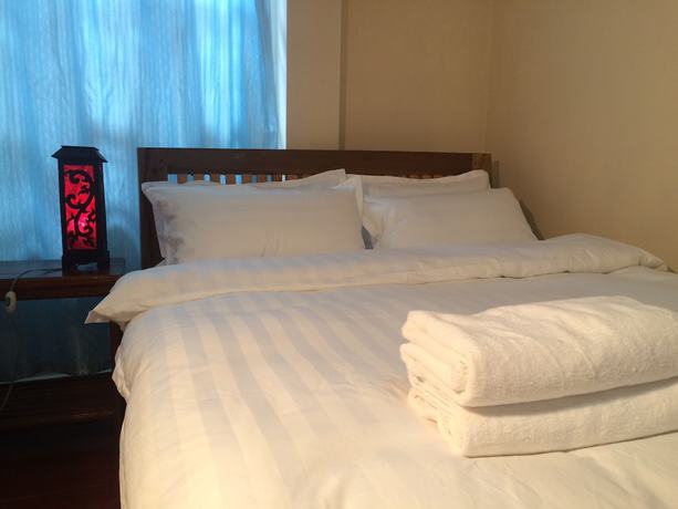 Imagen de la habitación del Hotel Amandra Villa. Foto 16