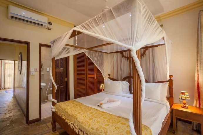 Imagen de la habitación del Hotel Amani Luxury Apartments Diani Beach. Foto 2