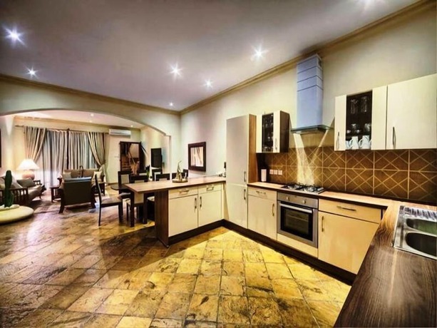 Imagen de la habitación del Hotel Amani Luxury Apartments Diani Beach. Foto 8