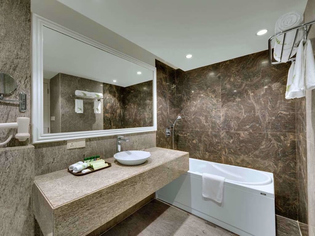 Imagen de la habitación del Hotel Amanora The Fern Hotels and Club. Foto 8