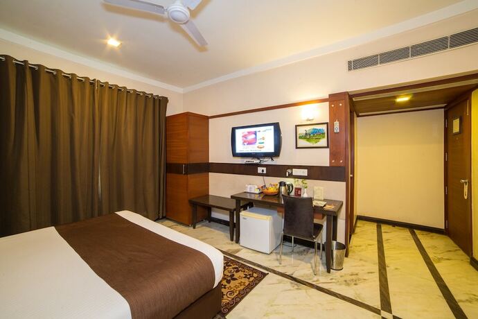Imagen de la habitación del Hotel Amantra Comfort. Foto 19