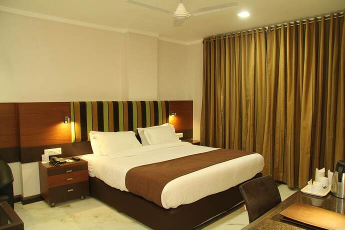 Imagen de la habitación del Hotel Amantra Comfort. Foto 20