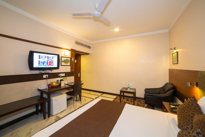 Imagen de la habitación del Hotel Amantra Comfort. Foto 23