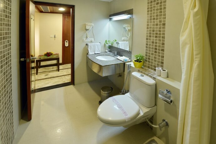 Imagen de la habitación del Hotel Amantra Comfort. Foto 25