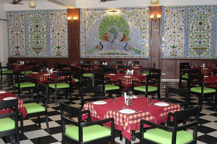 Imagen del bar/restaurante del Hotel Amantra Shilpi Resort and Spa. Foto 6