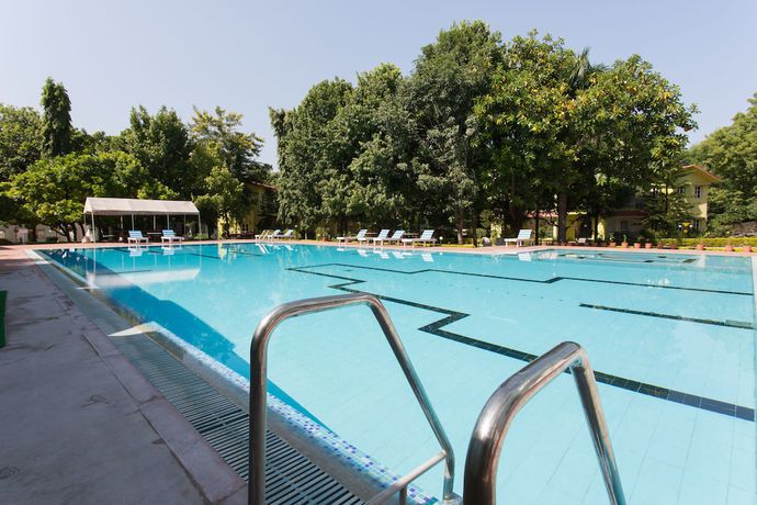 Imagen de la piscina del Hotel Amantra Shilpi Resort and Spa. Foto 20