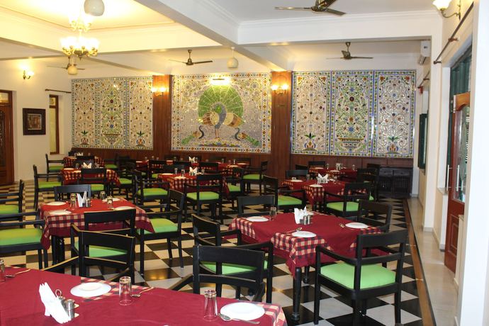Imagen del bar/restaurante del Hotel Amantra Shilpi Resort and Spa. Foto 7