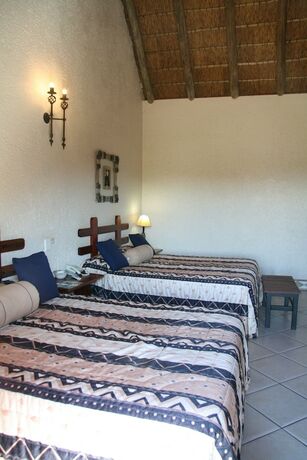 Imagen de la habitación del Hotel Amanzingwe Lodge Conference Centre and Spa. Foto 27