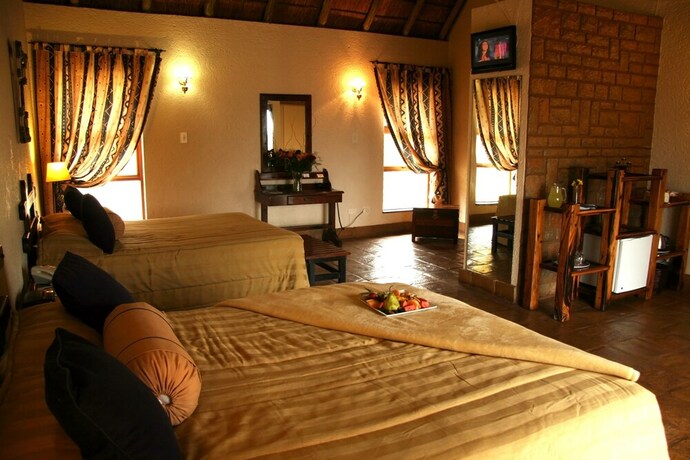 Imagen de la habitación del Hotel Amanzingwe Lodge Conference Centre and Spa. Foto 32