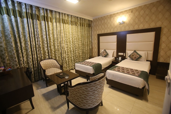 Imagen de la habitación del Hotel Amar Inn. Foto 10