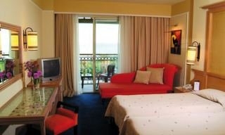 Imagen de la habitación del Hotel Amara Beach Resort. Foto 10