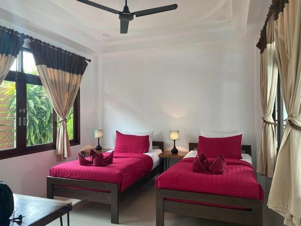 Imagen de la habitación del Hotel Amara Beach Resort. Foto 17