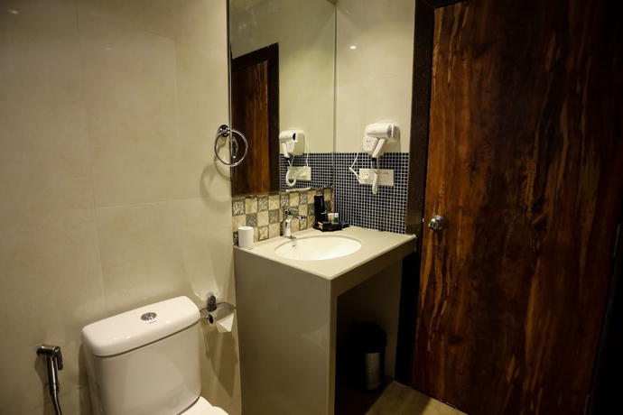 Imagen de la habitación del Hotel Amara Grand. Foto 9