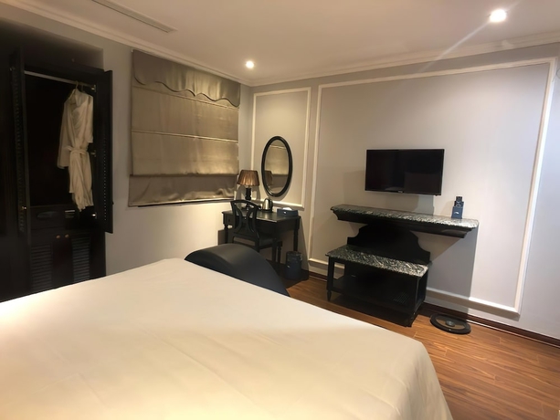 Imagen de la habitación del Hotel Amara Hanoi. Foto 9