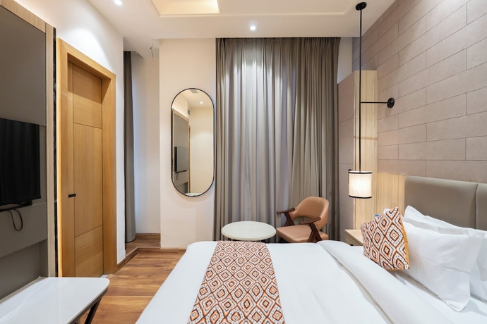Imagen de la habitación del Hotel Amara Portico. Foto 1