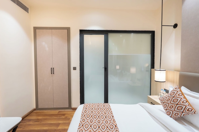Imagen de la habitación del Hotel Amara Portico. Foto 4