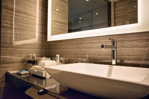 Imagen de la habitación del Hotel Amara Signature Shanghai. Foto 5