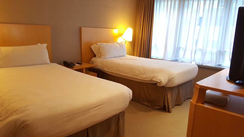 Imagen de la habitación del Hotel Amara Singapore. Foto 9