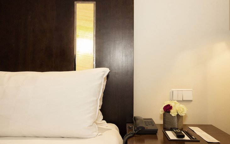 Imagen de la habitación del Hotel Amara Singapore. Foto 12