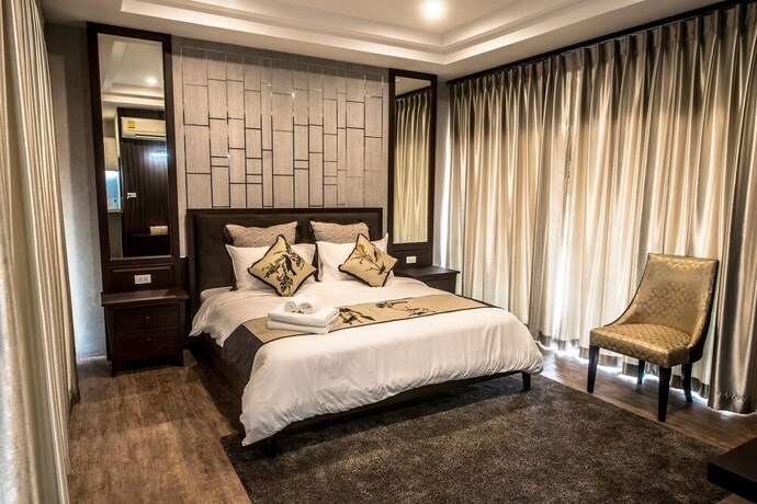 Imagen de la habitación del Hotel Amara Villa Khao Ka Lok. Foto 16