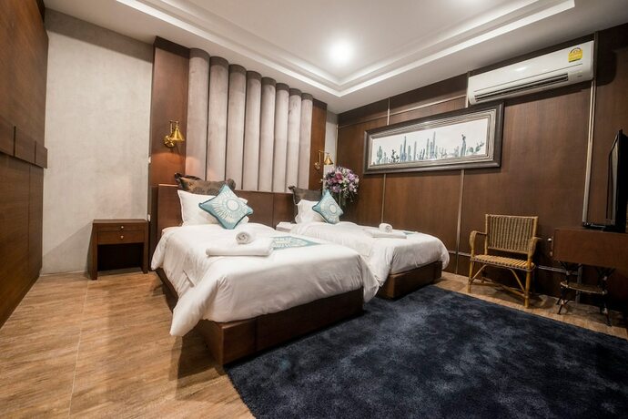 Imagen de la habitación del Hotel Amara Villa Khao Ka Lok. Foto 17